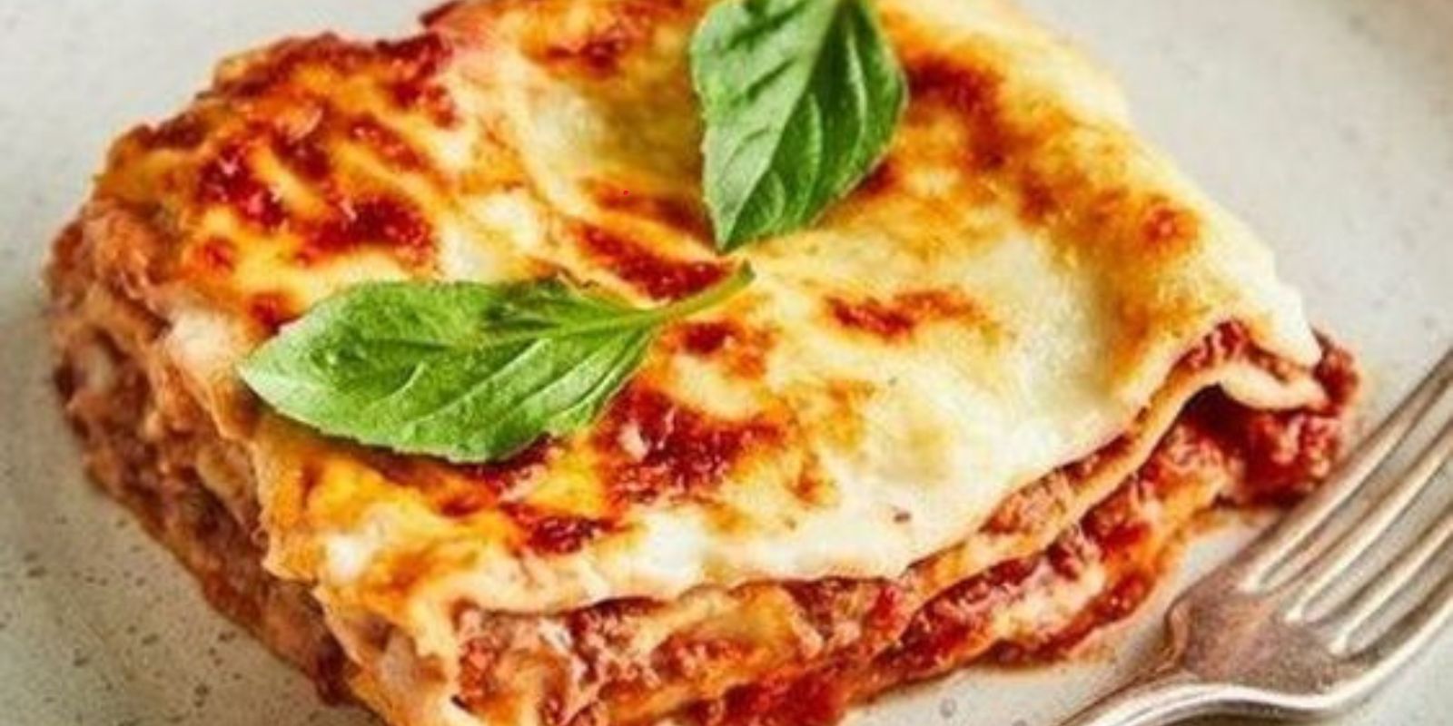 Gerollte Lasagne mit Schinken und Pilzen - Rezepte &amp; Tipps